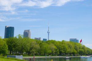 Park by the lake and Toronto skyline in the background. 